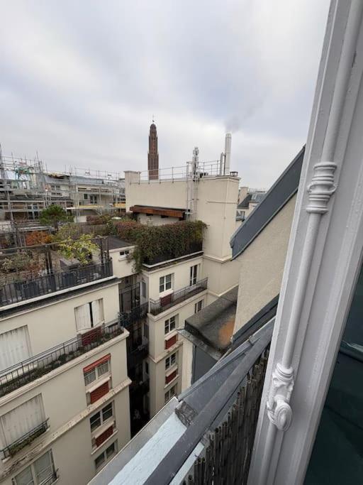 Sur Les Toits De Parijs